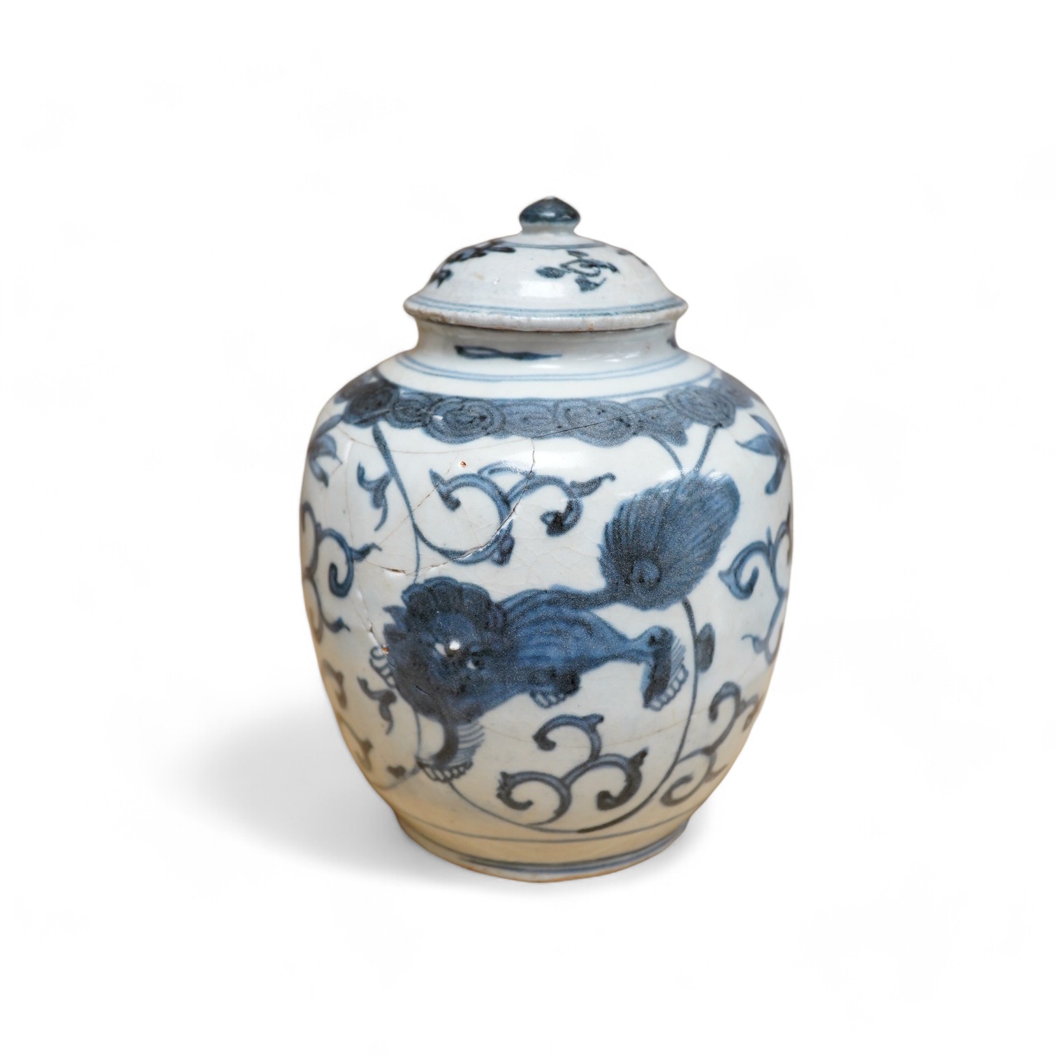 A Chinese blue and white Lion-dog jar and cover, late Ming dynasty, 17cm. Condition - poor